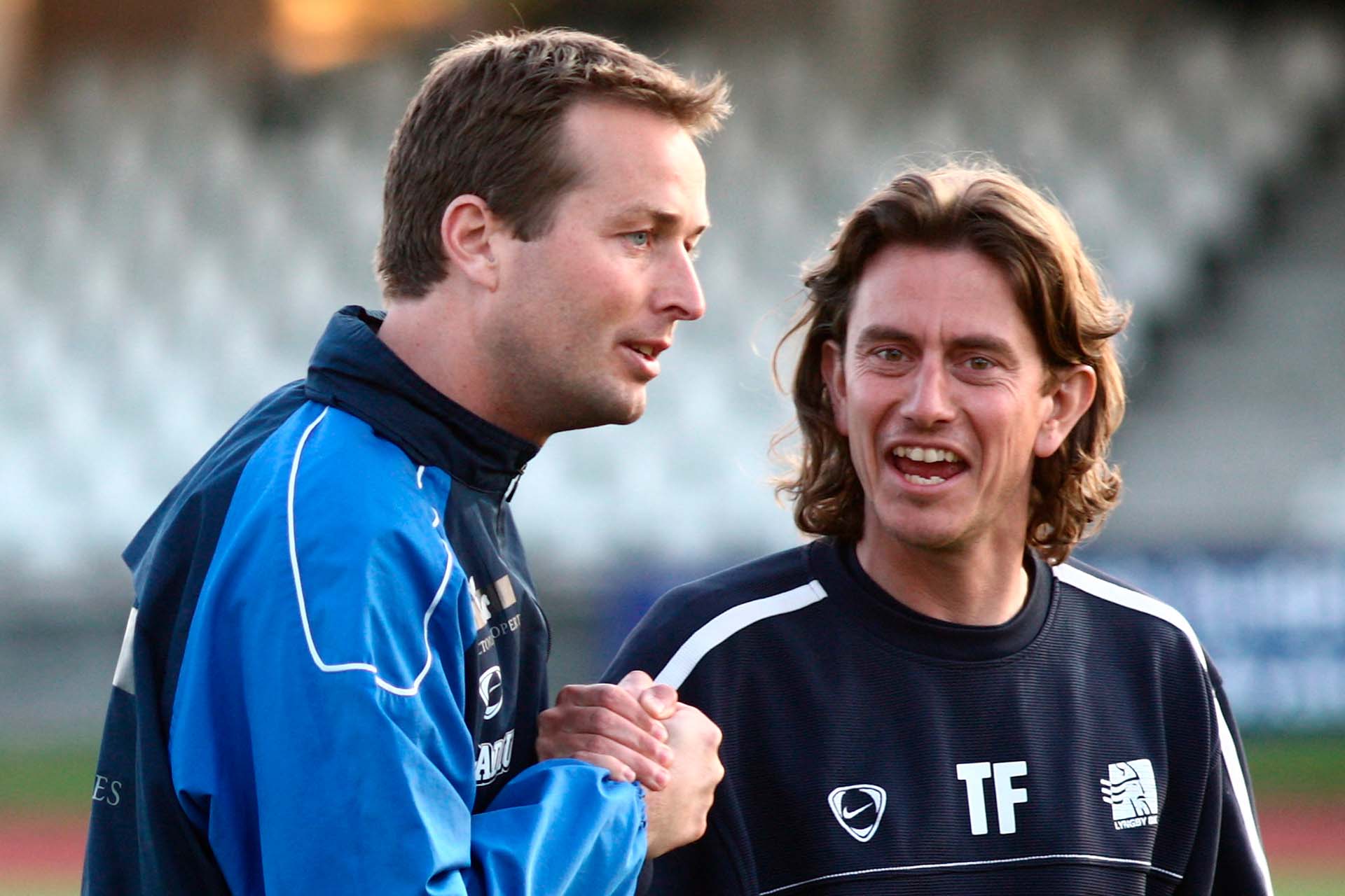 Frank og Hjulmand giver hånd